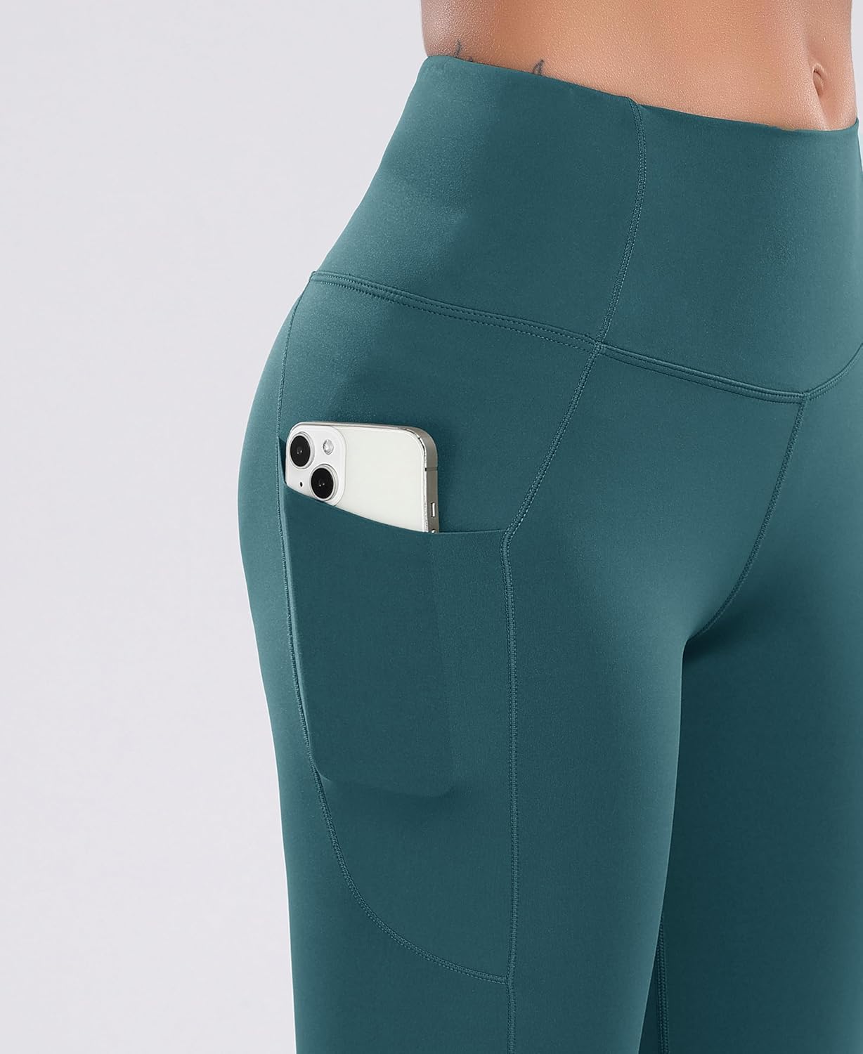 Elevate Your Workout with Oalka Women's Teal High Waist Yoga Shorts Featuring Convenient Side Pockets