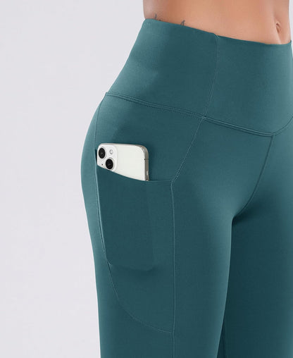 Elevate Your Workout with Oalka Women's Teal High Waist Yoga Shorts Featuring Convenient Side Pockets