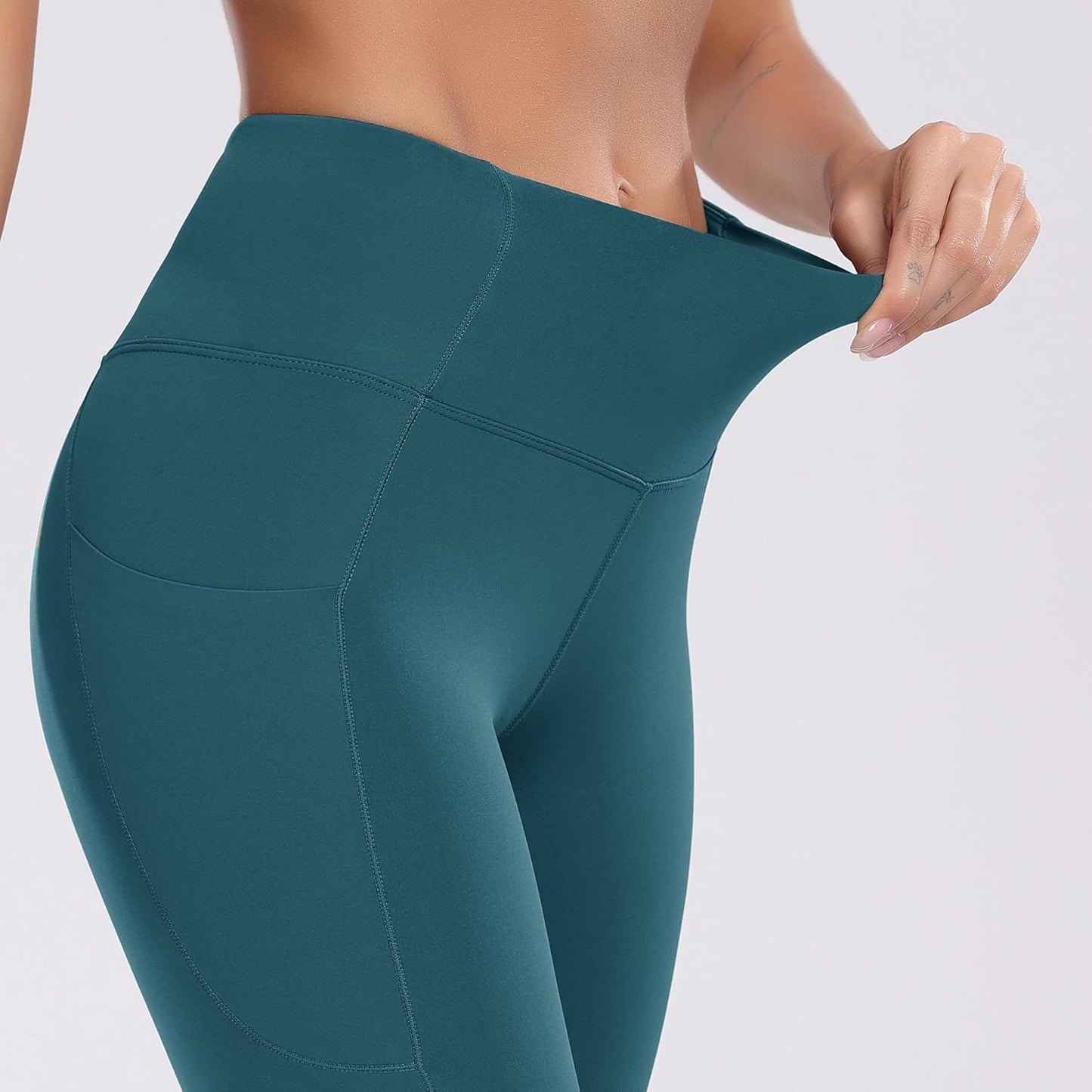 Elevate Your Workout with Oalka Women's Teal High Waist Yoga Shorts Featuring Convenient Side Pockets