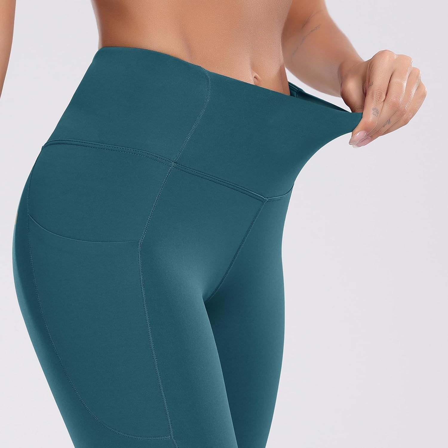 Elevate Your Workout with Oalka Women's Teal High Waist Yoga Shorts Featuring Convenient Side Pockets
